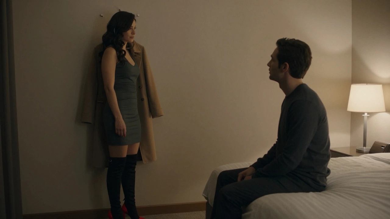 A woman turns to face a man in a hotel room, hanging her coat, boots and dress conveying quiet confidence.